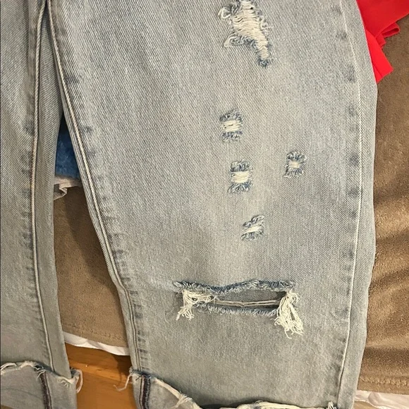 Alice + Olivia Light Blue Distressed Wide-Leg Jeans